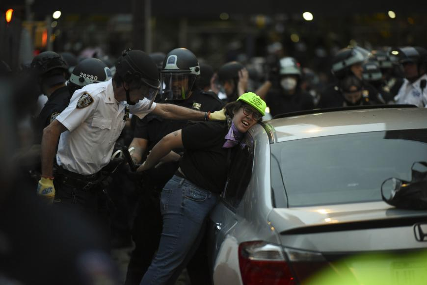 NYPD cops detain legal observer at Bronx protest on June 4th (Photo credit: Human Rights Watch)