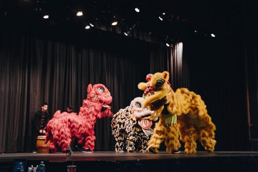 Students beat the drums as members of the Asian Cultural Club dance on stage in traditional Chinese lion costumes during the last live performance on March 30, 2019. (Credit: Great Neck North Asian Awareness Club on Facebook)