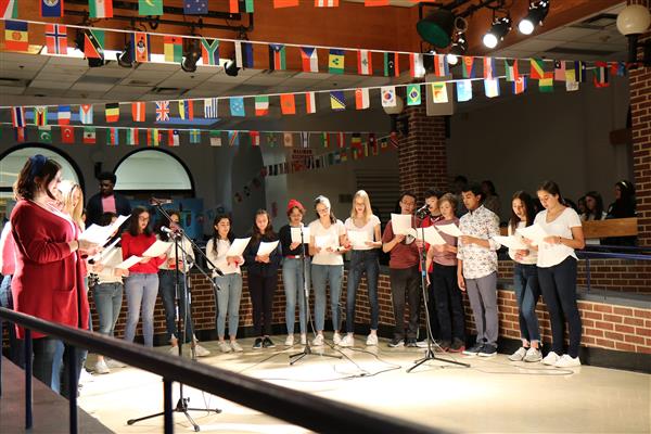 The French club performs a song at International Night on  March 19, 2019.