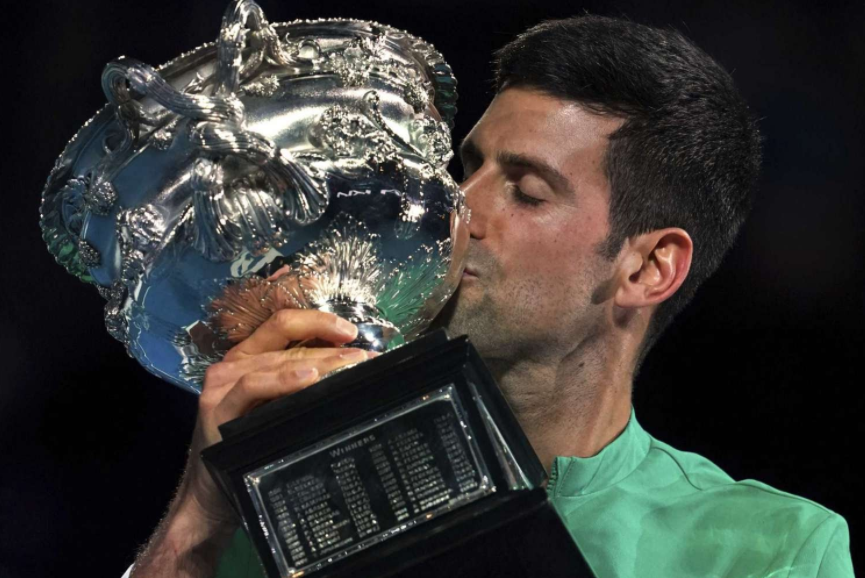 Novak Djokovic reigns supreme, defending the mens singles title at the 2021 Australian Open. (Credit: Mark Dadswell/AP)