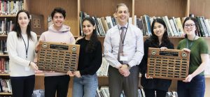 Caption: The valedictorians (Katharine Tang and Dani Kobrick, pictured first and second from the right) and salutatorians (Taylor Schnatz, Gavin Hakimian, and Nicole Nazar pictured first, second, and third from the left) pictured with Dr. Holtzman. (Credit: Great Neck Public Schools)
