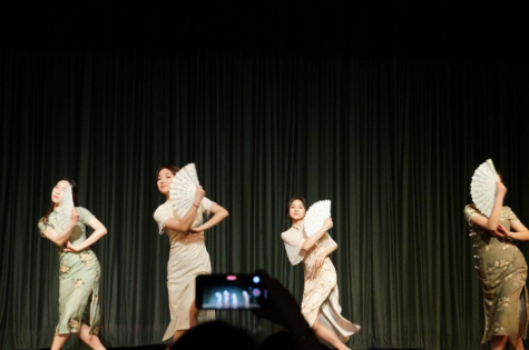 Mia He, Jiawen Li, Sandy Gao, and Suri Wong dancing in traditional clothing (Credit: Renee Lan).